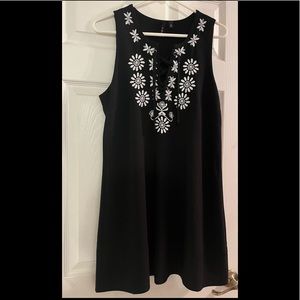 Sleeveless lined swing dress. XL